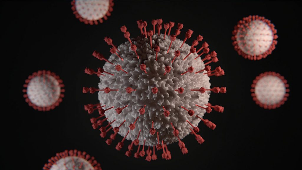 coronavirus particles on a black background
