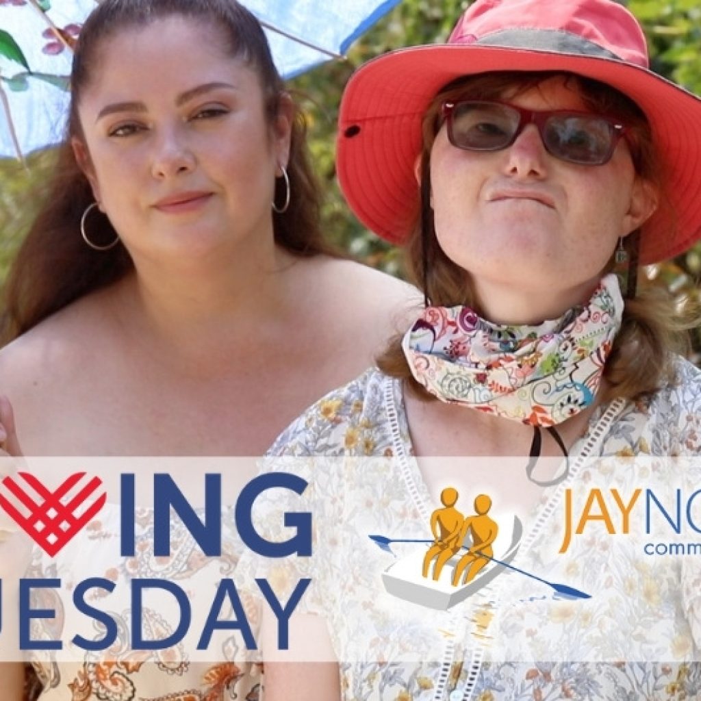 Two women wearing dresses and holding an umbrella with Giving Tuesday and JNCS logo overlaid