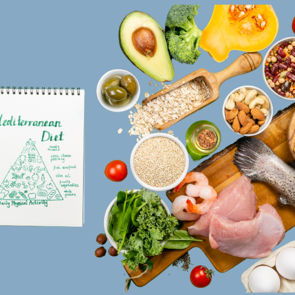 An arrangement of various foods on a light blue background representing a Mediterranean diet. The image includes an assortment of fresh vegetables, fruits, nuts, seeds, legumes, fish, chicken, and whole grains. There is also a notepad labeled "Mediterranean Diet," featuring a food pyramid illustration.