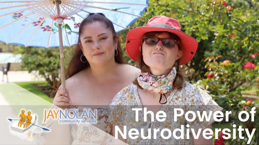 Two women standing outside, one holding a colorful umbrella, with the text "The Power of Neurodiversity" and Jay Nolan Community Services logo.