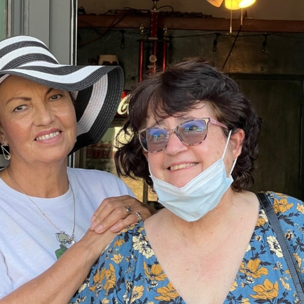 Marisol and Ilene smiling toward the camera