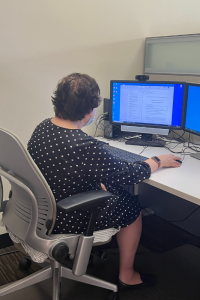 Ilene working at her computer