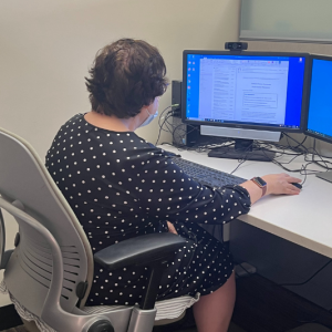 Ilene working at her computer