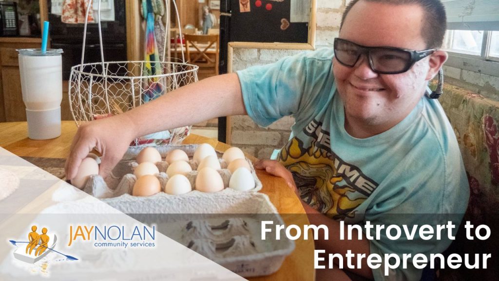 Video thumbnail featuring Earnie, a young Caucasian man wearing a turquoise tie-dye shirt sittign at a kitchen table with a carton of eggs. Text reads: "From Introvert to Entrepreneur"