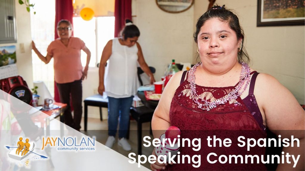 Video thumbnail featuring a latino woman in her home wearing a red dress. Text Reads: "Serving the Spanish Speaking Community"