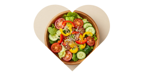 image of a colorful salad cropped in the shape of a heart